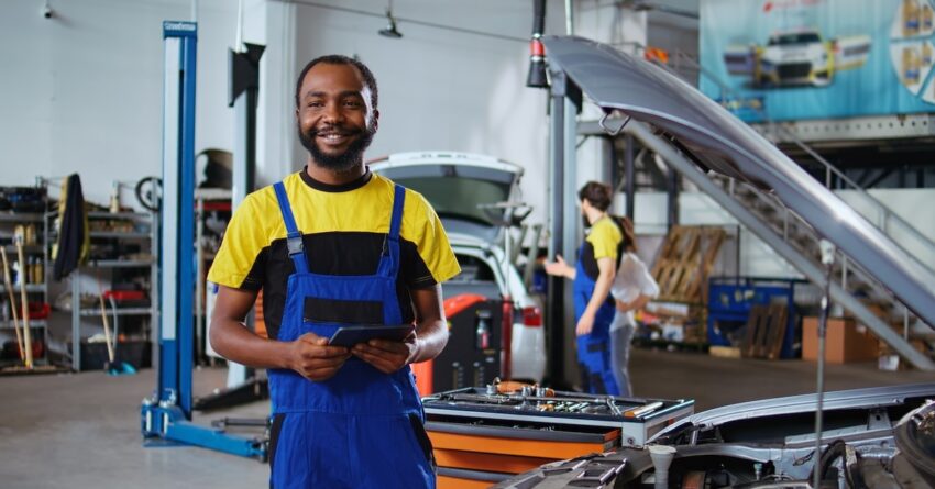 Expert does maintenance on client car